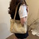 Wholesale Japanese Harajume-style hand-held tote bags for women in the summer of 2025, with contrasting colors and perforated single-shoulder bags, trendy underarm bags Wholesale Japanese Harajume-style hand-held tote bags for women in the summer of 2025, with contrasting colors and perforated single-shoulder bags, trendy underarm bags
