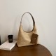The new summer beach bag is stylish and versatile, the commuter tote bag is fashionable and ethnic-style, and it is a grass-woven underarm bag or handbag