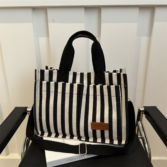 Commuter large-capacity hand-held tote bag for women, new 2024 autumn and winter collection, personalized striped single-shoulder bag, trendy casual crossbody bag Commuter large-capacity hand-held tote bag for women, new 2024 autumn and winter collection, personalized striped single-shoulder bag, trendy casual crossbody bag