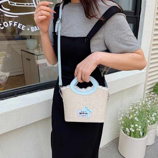 Wholesale Korean version straw woven color-blocking hand-held bucket bags for women, 2025 summer new stylish single-shoulder bags, versatile crossbody bags Wholesale Korean version straw woven color-blocking hand-held bucket bags for women, 2025 summer new stylish single-shoulder bags, versatile crossbody bags