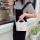 Wholesale Korean version straw woven color-blocking hand-held bucket bags for women, 2025 summer new stylish single-shoulder bags, versatile crossbody bags Wholesale Korean version straw woven color-blocking hand-held bucket bags for women, 2025 summer new stylish single-shoulder bags, versatile crossbody bags
