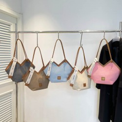 Wholesale fashionable color-blocking hand-held small bags for women, 2025 summer new large-capacity single-shoulder bags and trendy underarm bags