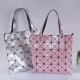 The 2024 new women's bag from Japan and South Korea is fashionable and simple, featuring a versatile geometric diamond-shaped tote bag The 2024 new women's bag from Japan and South Korea is fashionable and simple, featuring a versatile geometric diamond-shaped tote bag