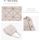 A new Japanese diamond-shaped diamond bag with a geometric underarm, a small square box, a limited edition macaron-colored nail handle, and a shoulder bag for women A new Japanese diamond-shaped diamond bag with a geometric underarm, a small square box, a limited edition macaron-colored nail handle, and a shoulder bag for women